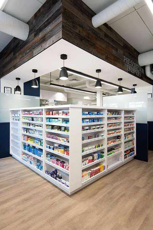 The pharmacy counter display in the newly built store is well organized and easy to use. The layout makes it easy to find the products that you need.