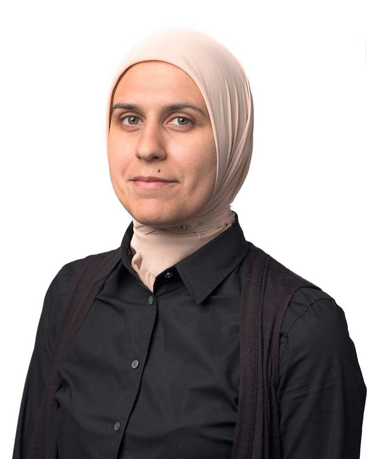 Headshot of woman with head scarf