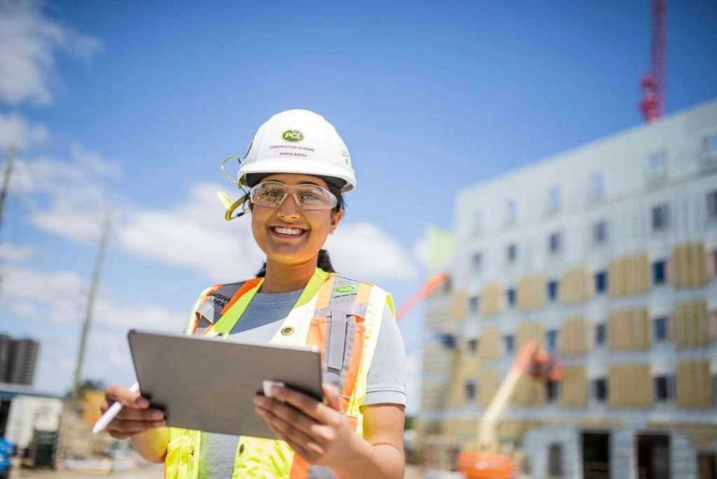 Female construction worker with tablet