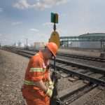 Rail worker throws switch