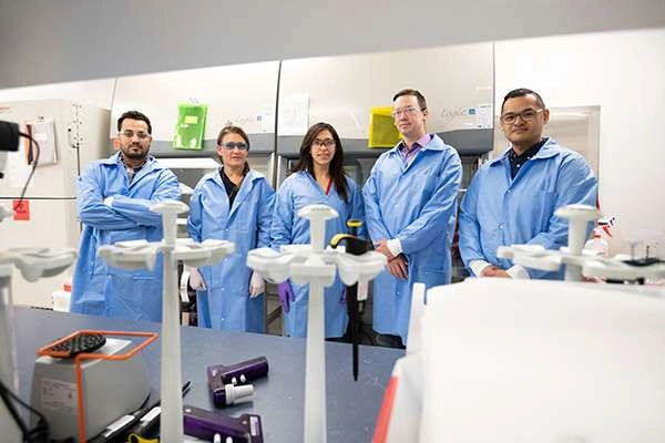 A group photo of lab researchers.