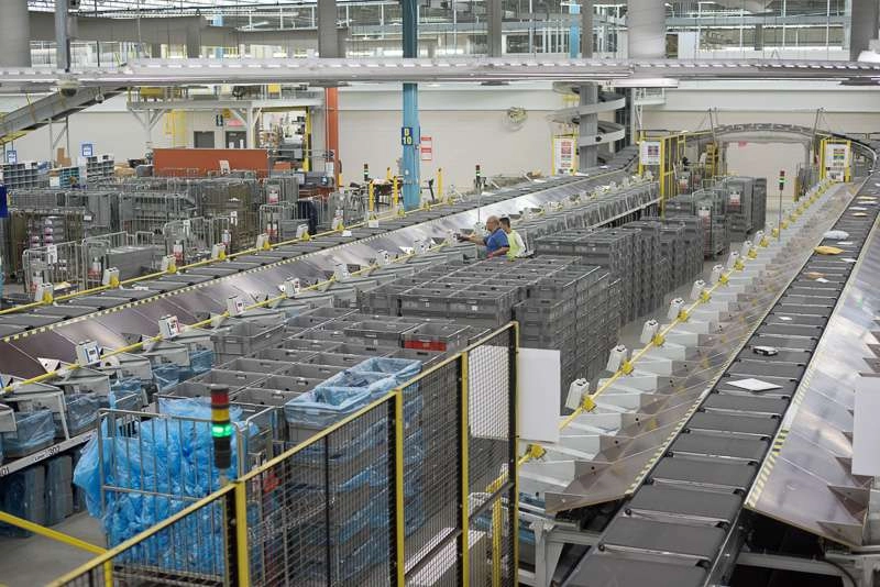 Wide shot of mail sorting facility