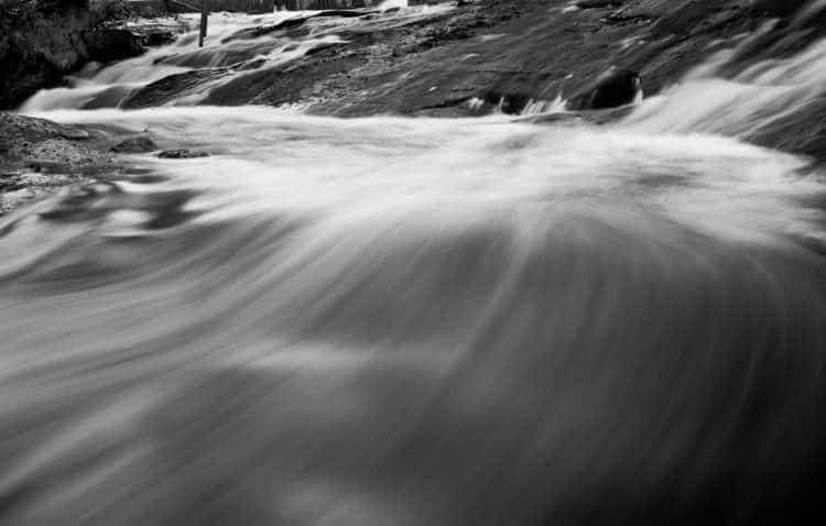 A fast moving river near whiteshell provincial park, manitoba © robert lowdon