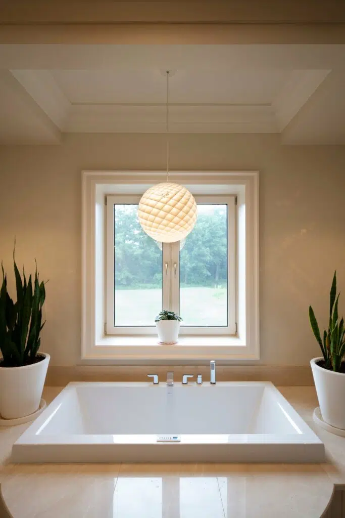 Light fixture over porcelain soaker bath tub