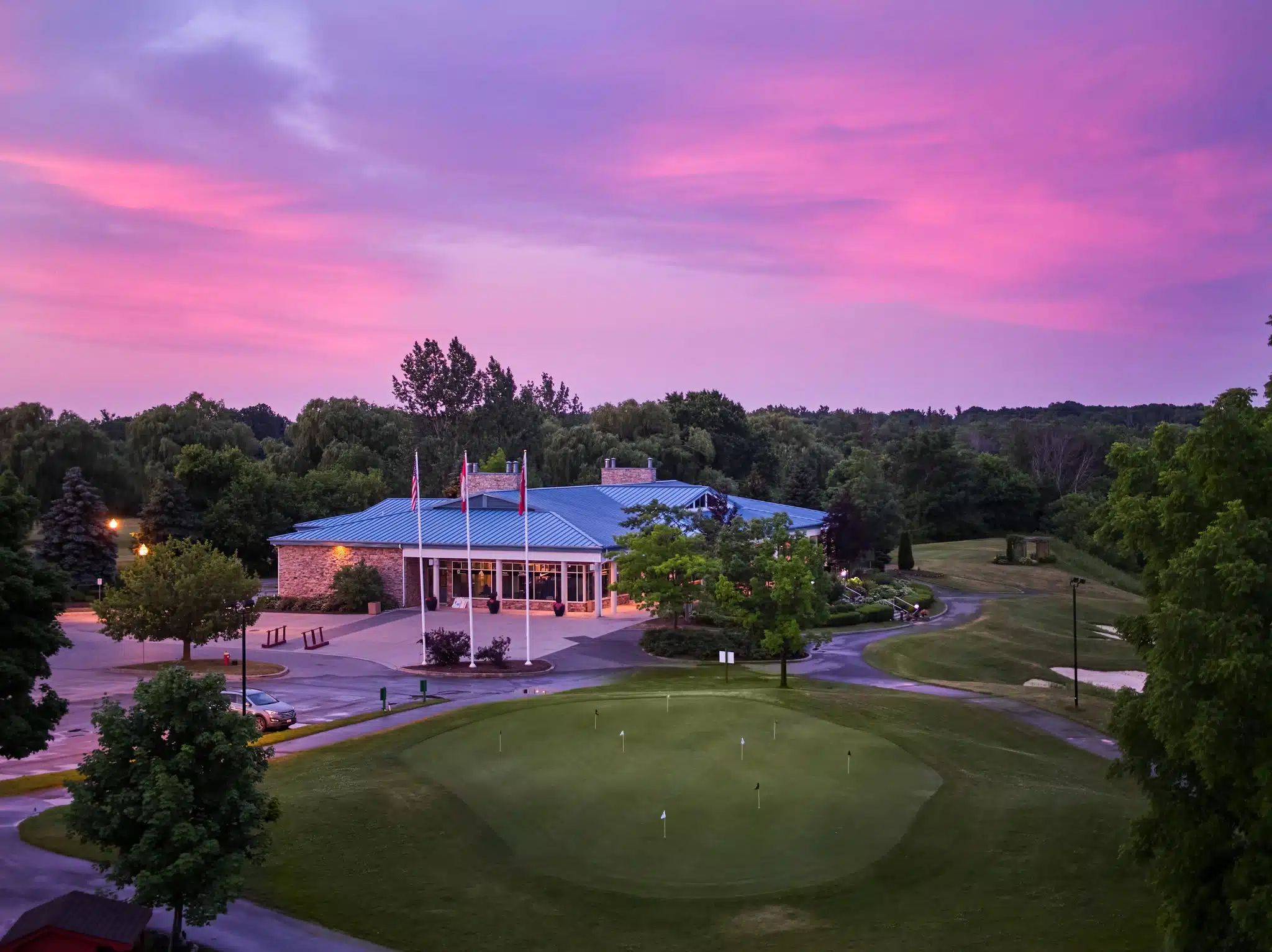 Epic sunrise aerial photograph of clubhouse.