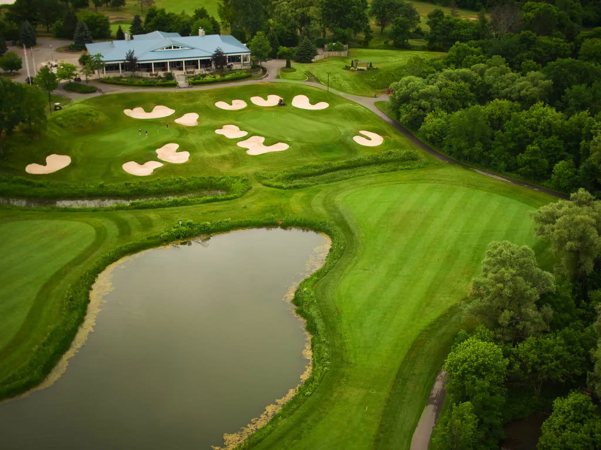 Aerial image of signature holes at royal ontario with clubhouse in background.