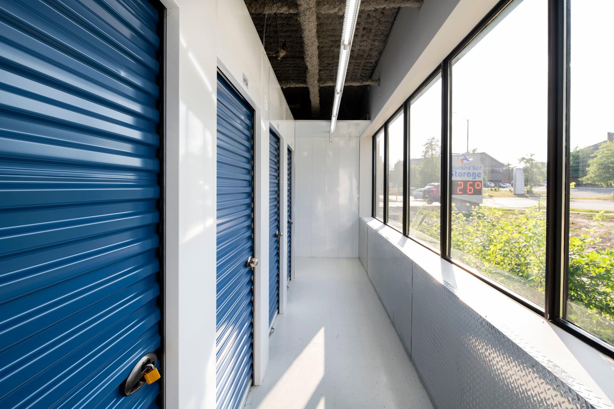 Unique storage units featuring natural light in the hallways.